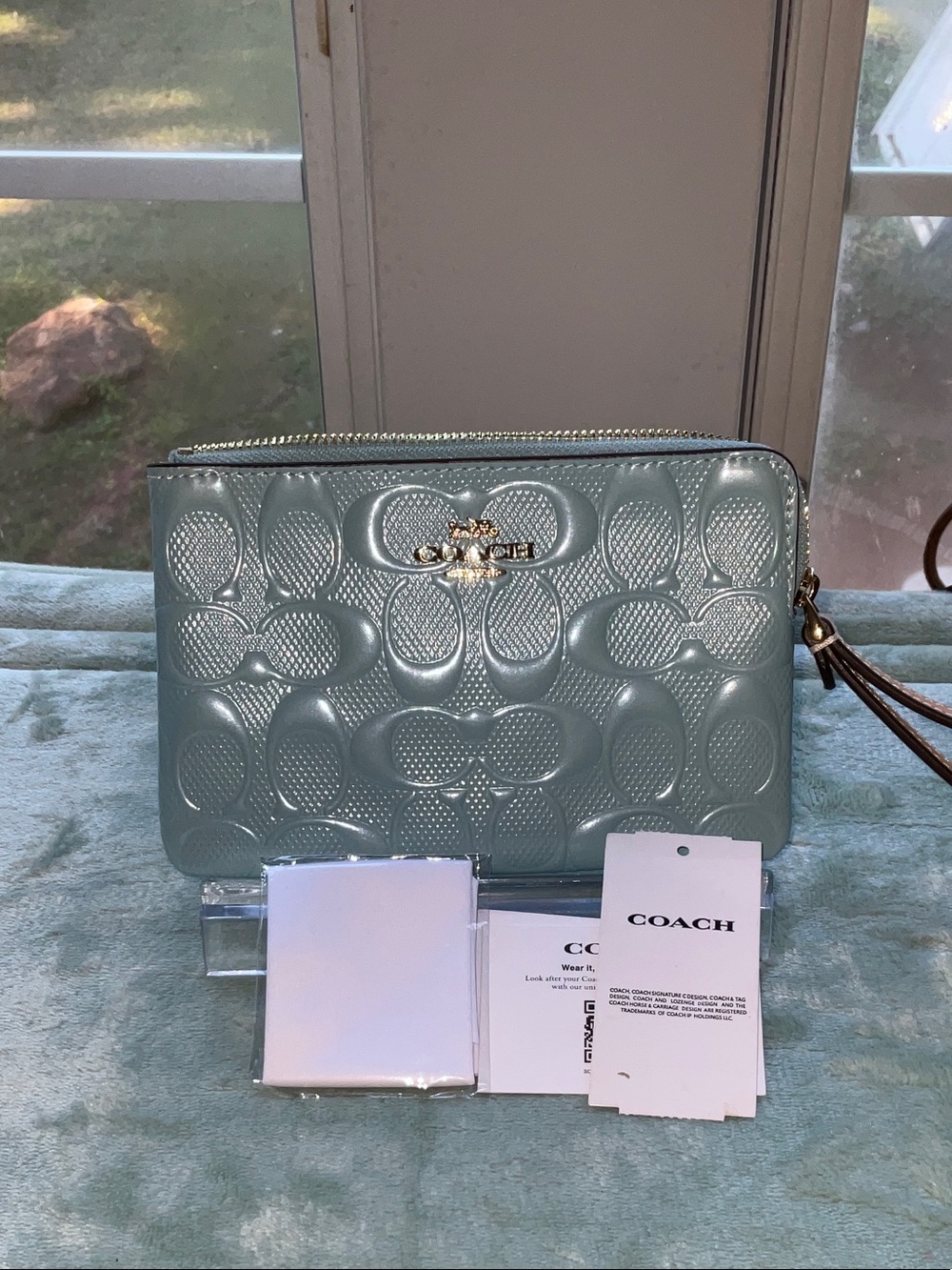 Coach Patent Embossed Clutch in Pale Blue